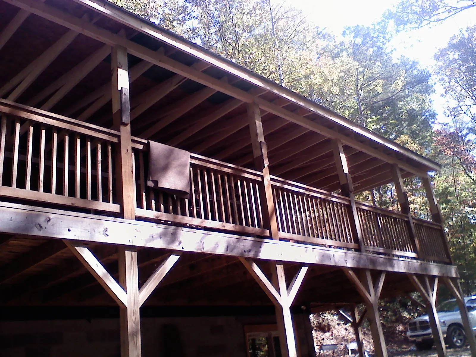 Timber framing under a new elevated porch and deck — Roof Leak Repair in Pigeon Forge by Roofing Brothers